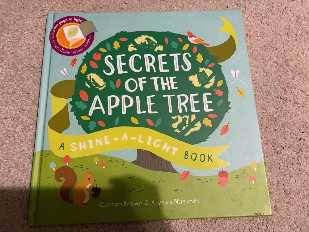 Secrets of the Apple Tree (Shine-A-Light Series) Hardcover Book